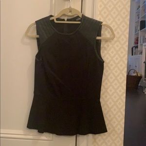 Blank going out top with leather in the shoulders